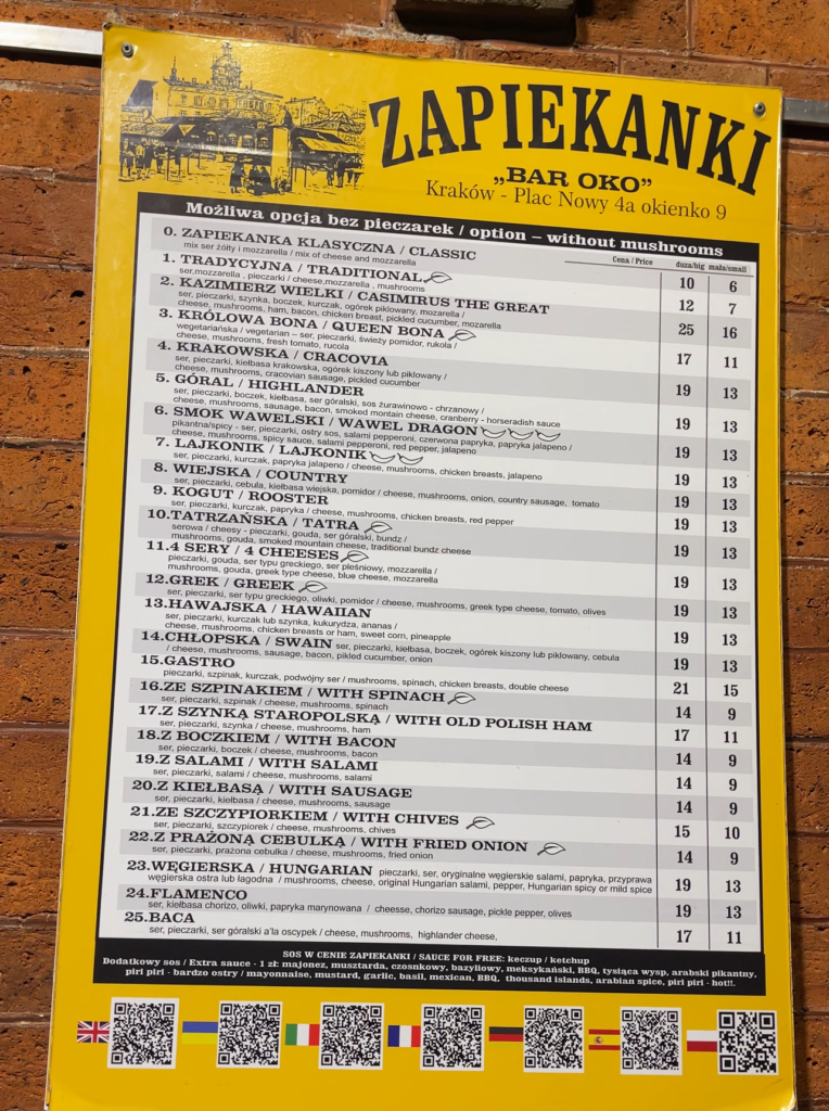 Bar Oko Menu with different types of Zapiekanki listed in Polish with QR codes taking you to different menu languages