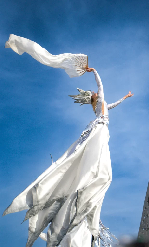 person with white dress on floating in the wind 