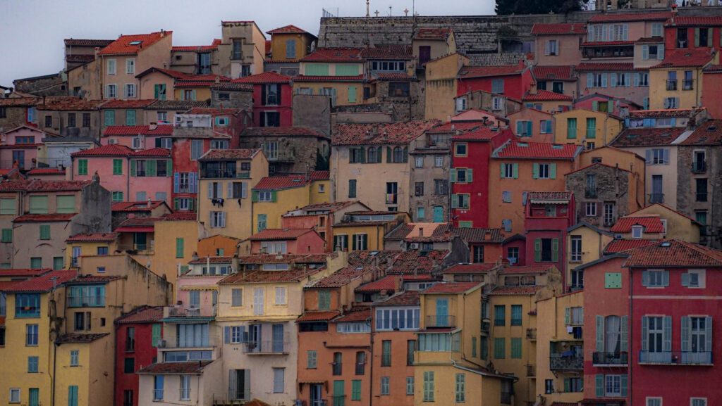 The beautiful colorful buildings of Menton on the hillside. They popout in colors like red, yellow, beige