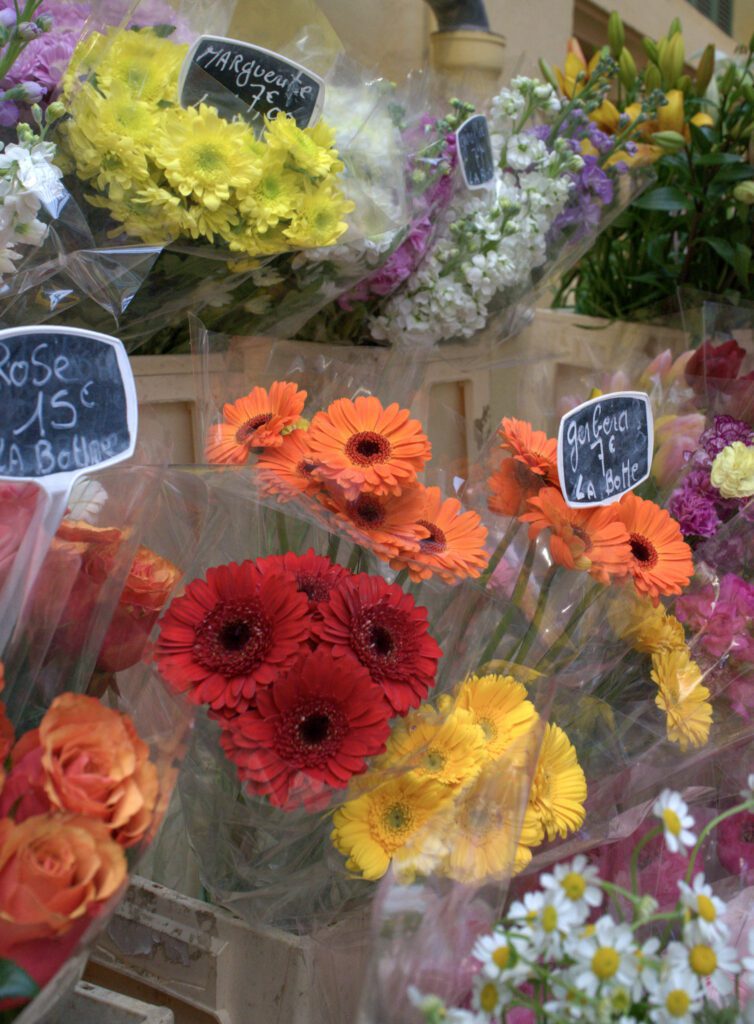Various colorful Flowers are on display at the Market hall in Menton