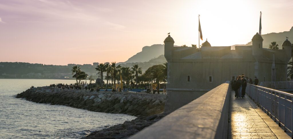 A Vibrant Sunset setting over Menton France and its port. 