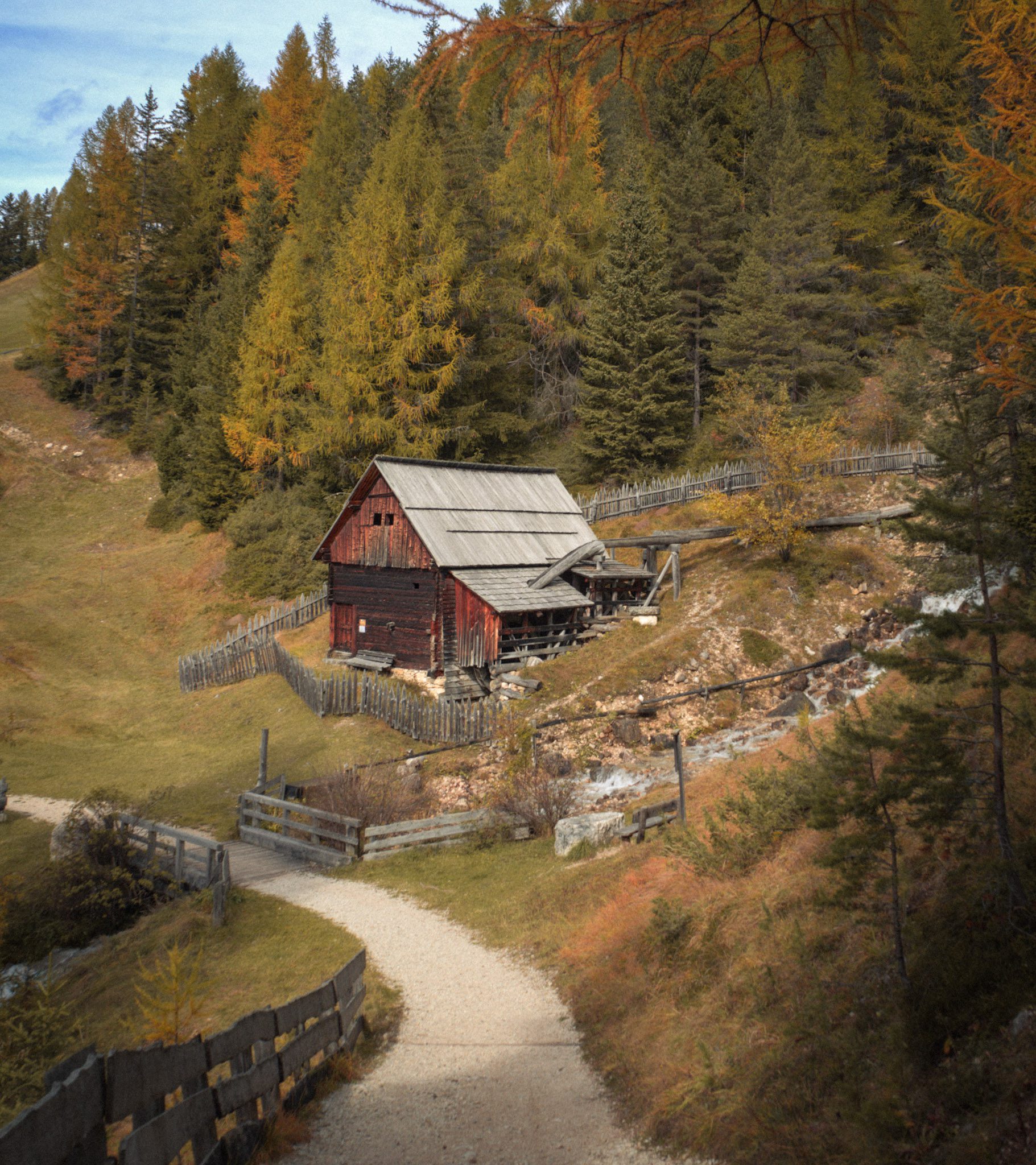 Historical Cabin in Alta Badia set against a forest