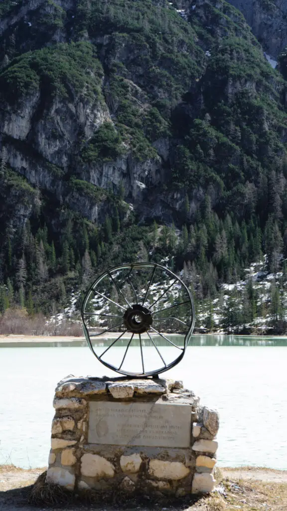 Lago di Landro sits beyond a dedicated memorial for those who fought during WWI at the base of Monte Piana