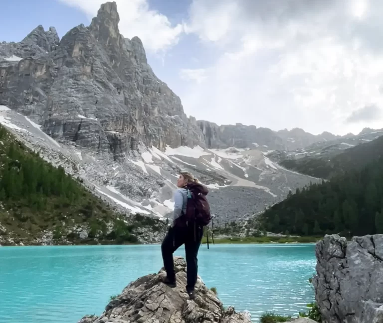 Author standing on rock looking out over Lago Di Sorapis