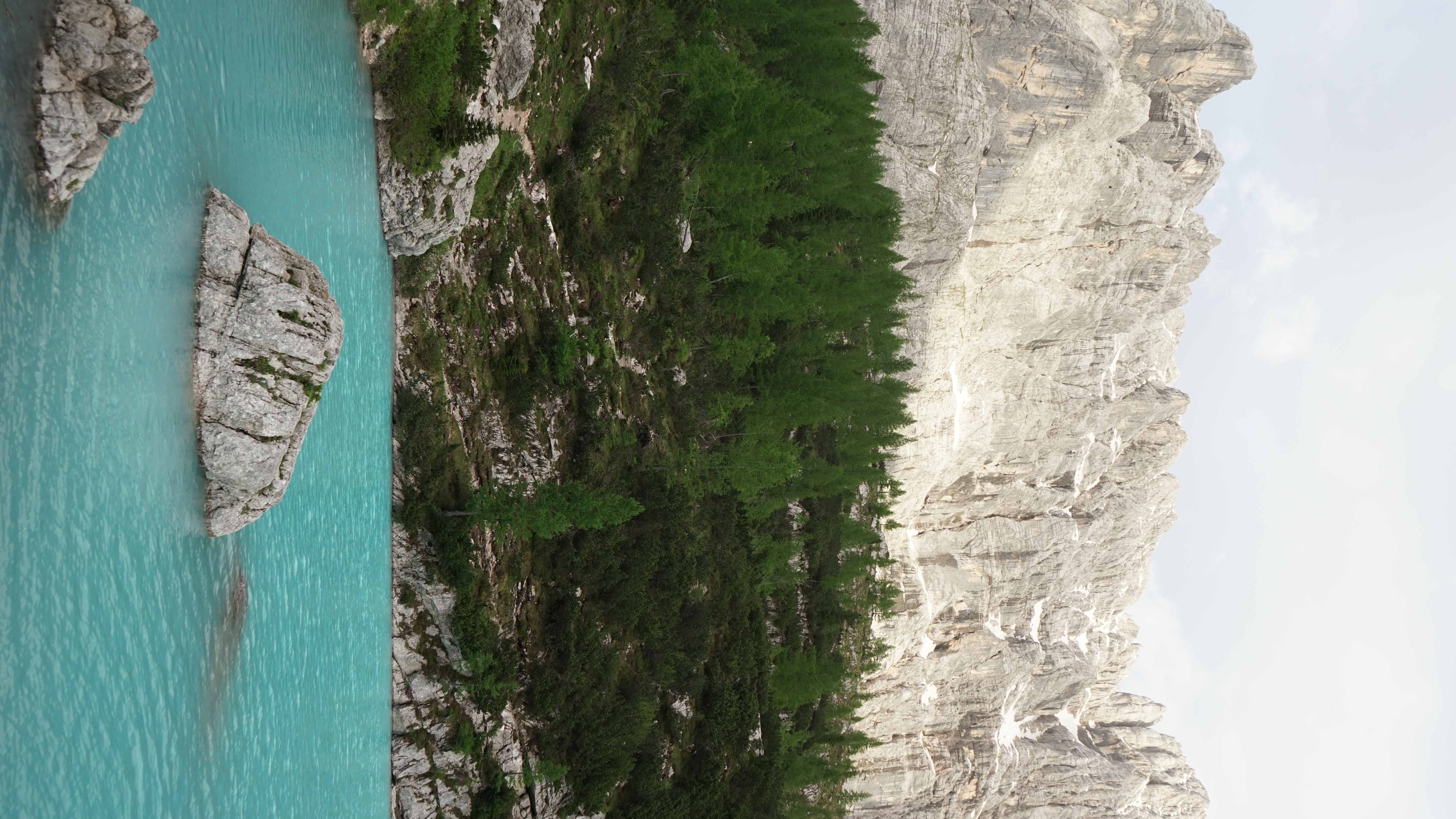 baby blue waters of lago di sorapis in the dolomites
