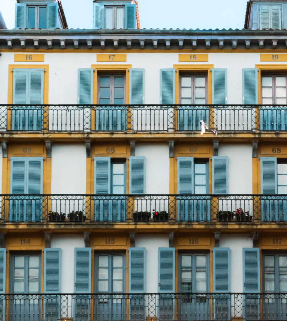 San Sebastian Old Town Windows in vibrant hues of gold and blue