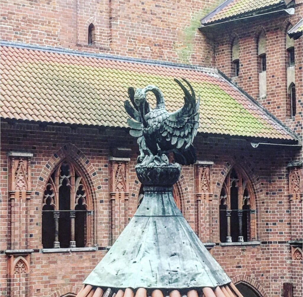 Swan water fountain in the courtyard of Malbork Castle