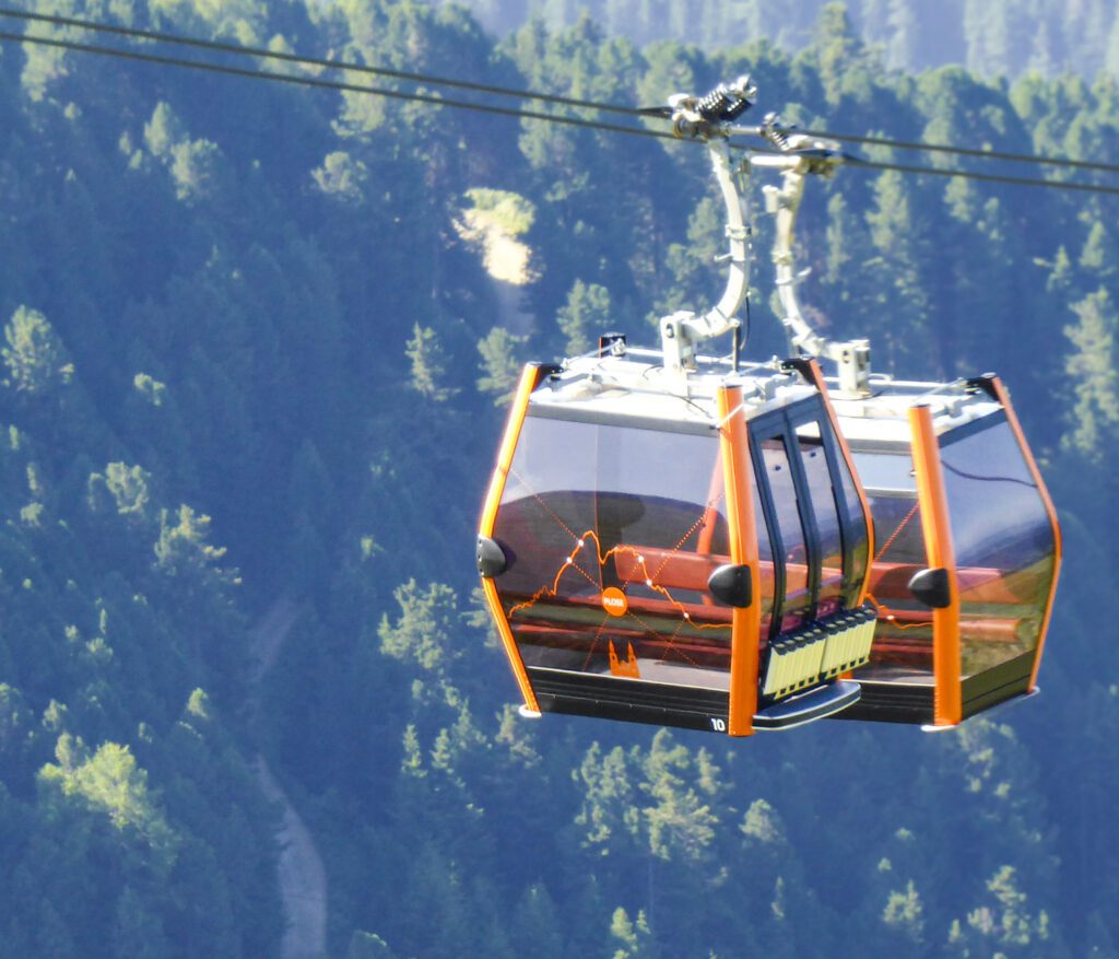 Plose Cable Car with alpine meadow in the back