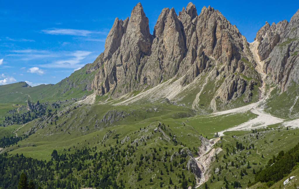 Mountains in the Dolomites rise against the scenery
