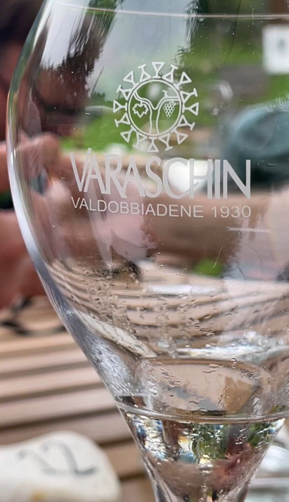 a glass that is beading sweat with the words Varaschin on it