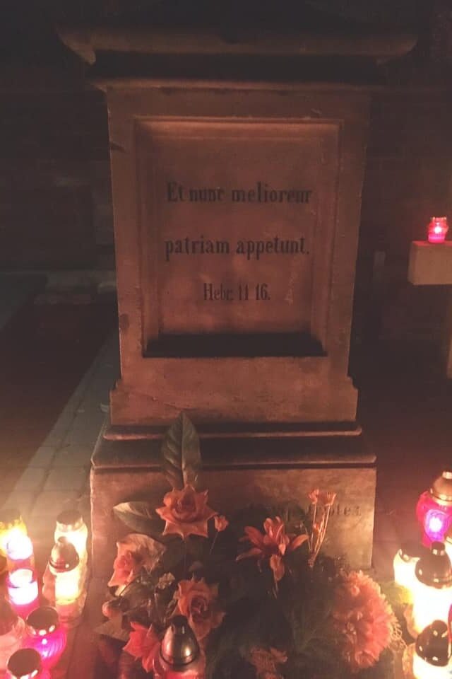 A Grave with lights in a cemetery in Poland. 