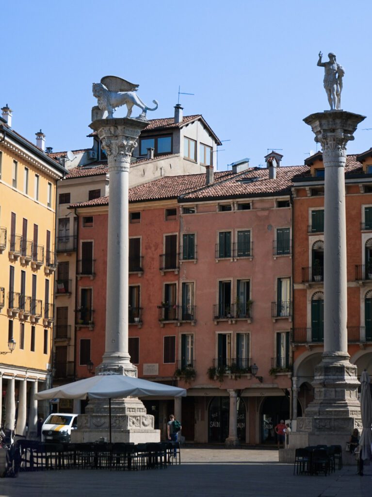 Two columns at the Piazza dei Signori in Vicenza italy, one with st. mark and one with the venetian lion