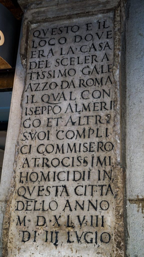 Tablet of Romeo in Corso Palladio in Vicenza, Italy. A tablet on a wall engraved with latin. 