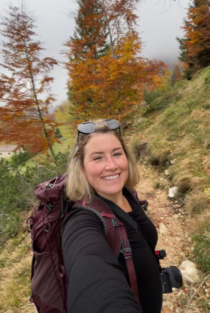 Solo hiking Sentiero Grandi Alberi trail near Vicenza Italy in autumn with colorful forest backdrop