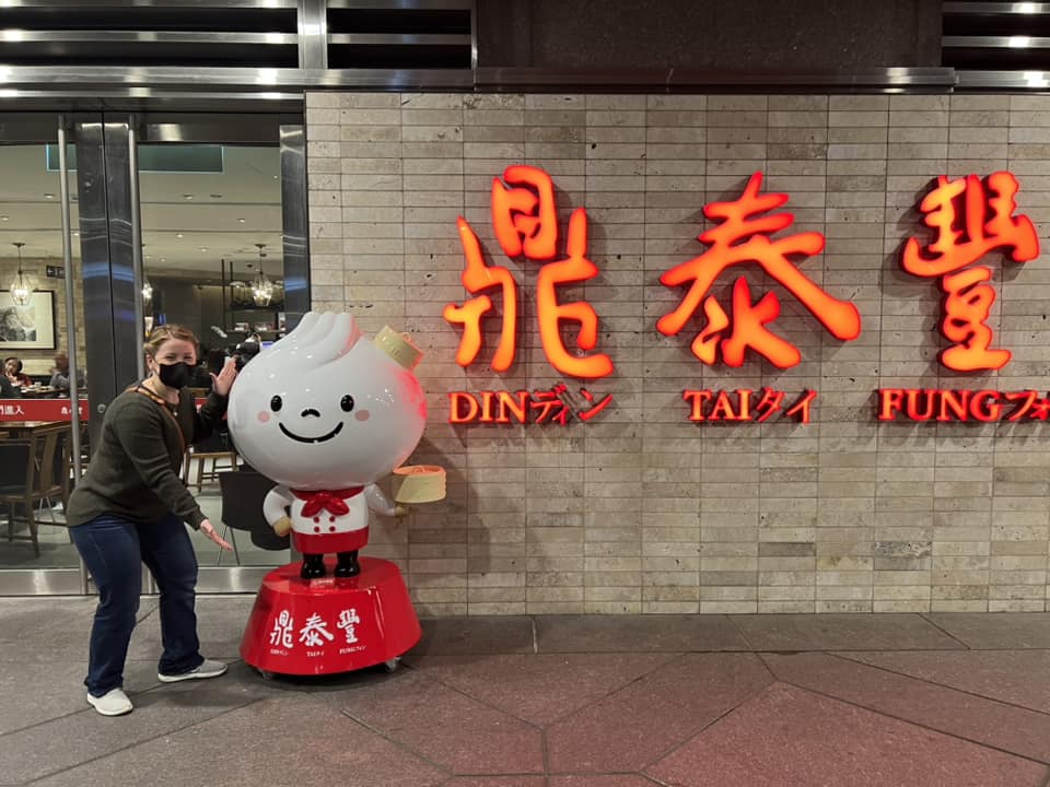 Front of Din Tai Fung with Author posing for a photo in Taipei Taiwan