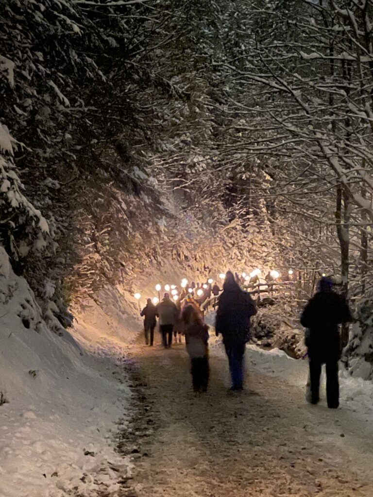 a torchlit procession to the Ravenna Gorge Christmas market