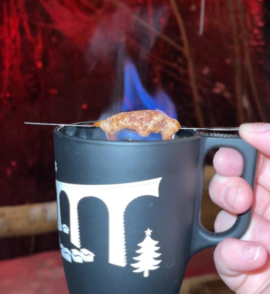 Die Feuerzangenbowle, a christmas punch drink that is lit on fire as seen here at the Ravenna Gorge Christmas Market