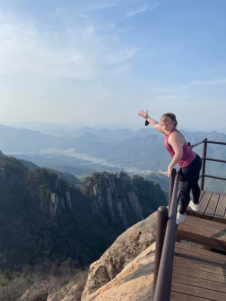 Kimberly Kephart standing on the top of Mungjangdae Peak in Songnisan National Park