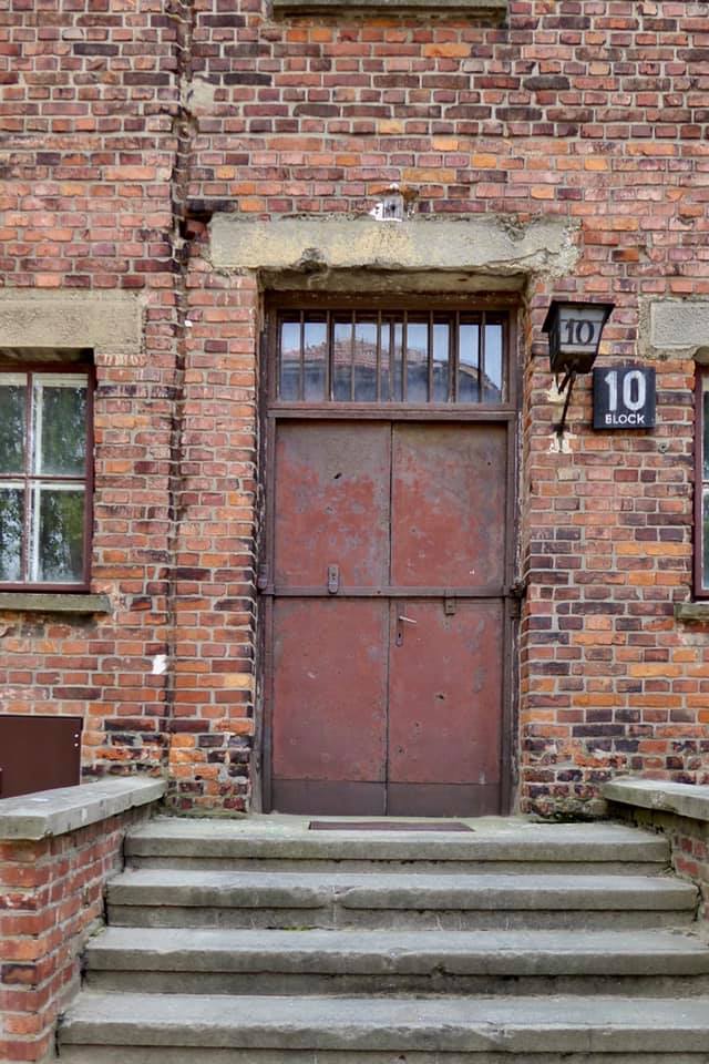 Red brick buidling with the number 10 on it at auschwitz birkenau