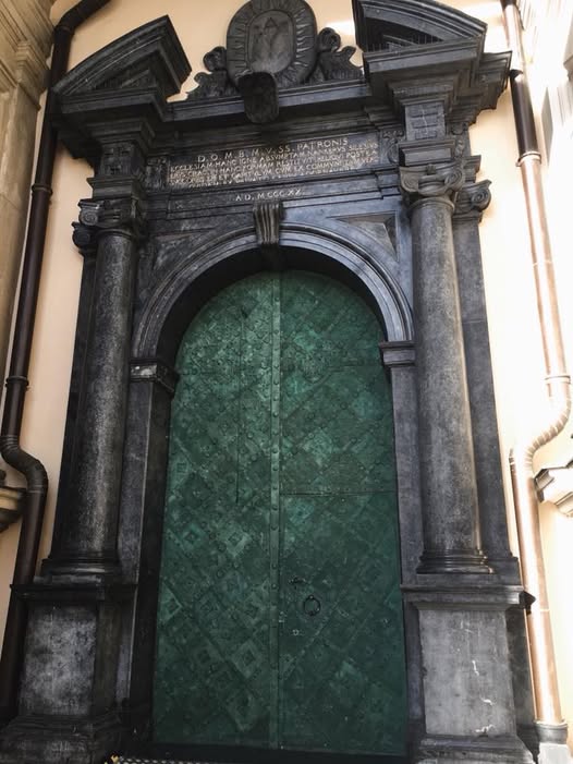 Green door of Wawel Castle in Krakow Poland