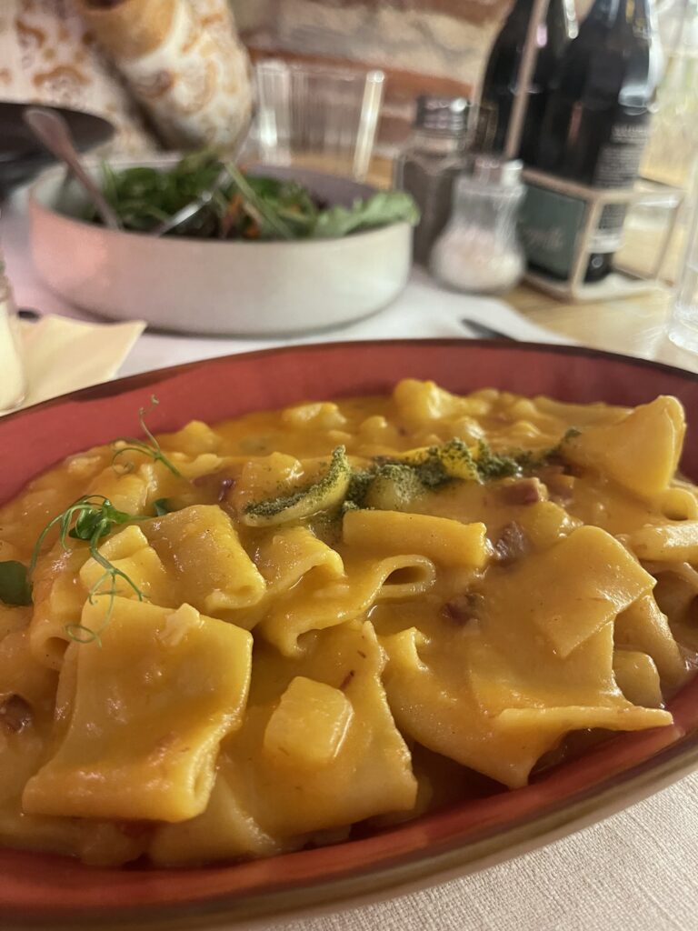 Regional Dish at Locandina Capello with cheese on it
