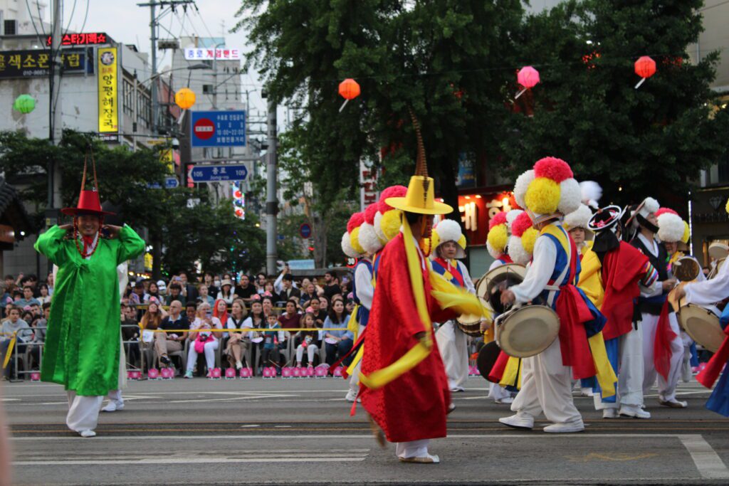 Traditional costumes are worn as dancers parade around in outfits during the Lantern Parade in Seoul during YeonDeungHoe
