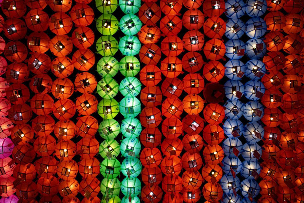 Beautiful Lanterns hanging in red, green and blue at Jogyesa Temple