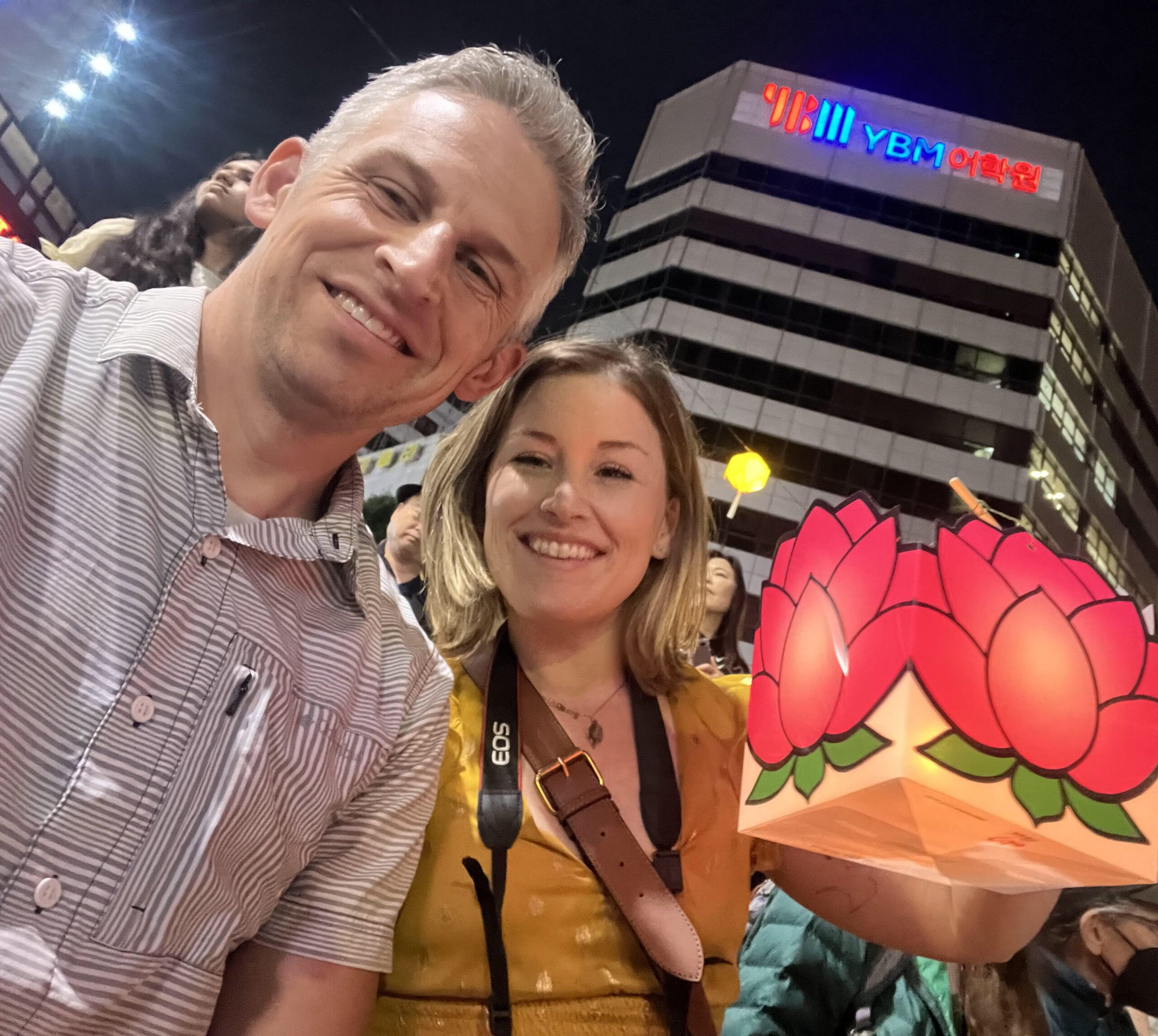 Man and woman smiling at Lantern festival in Seoul