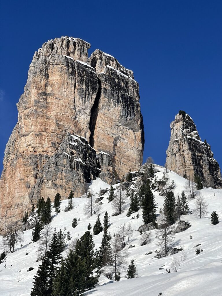 The beautiful peaks of Cinque Torri peaking out against the blue sky