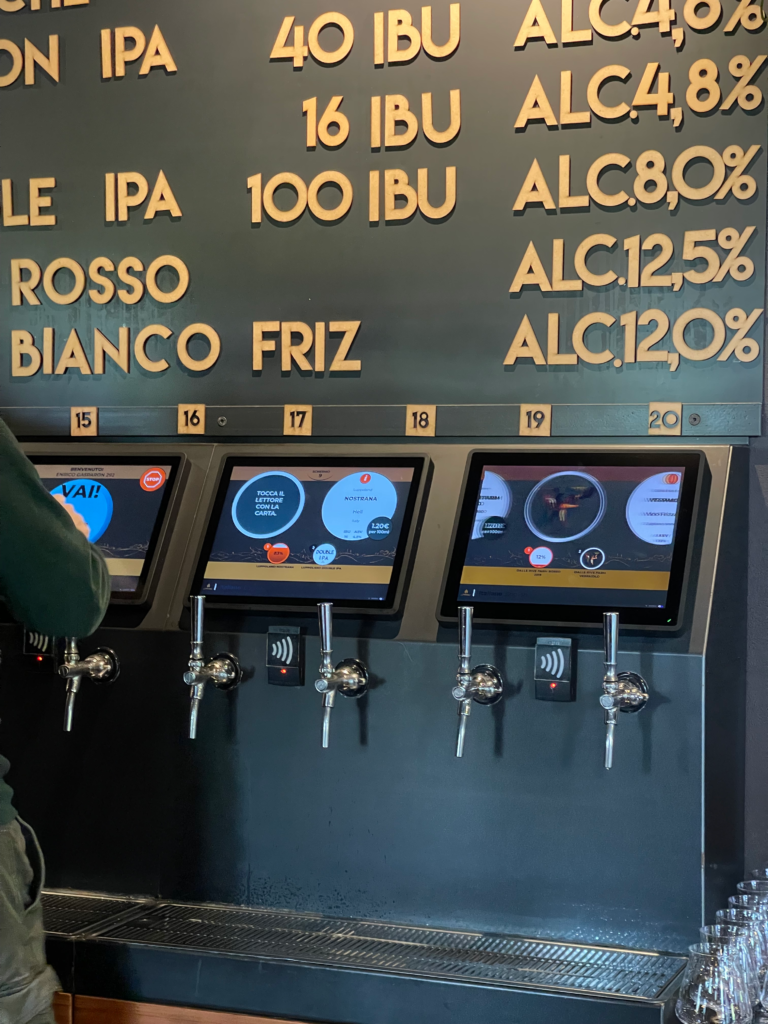 an electronic tap machine with a list of beers written in italian at Luppoland in Breganze, Italy Province of Vicenza