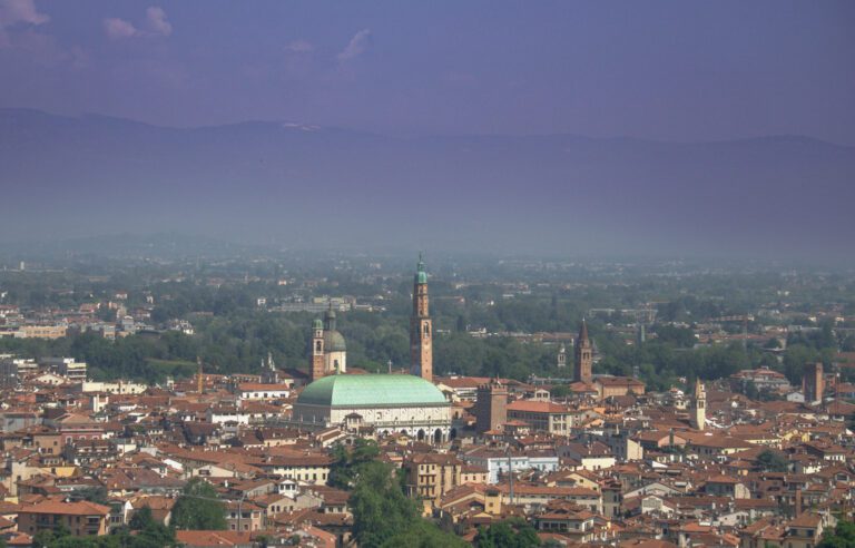 Vicenza seen from Monte Berico with mountains in the background.