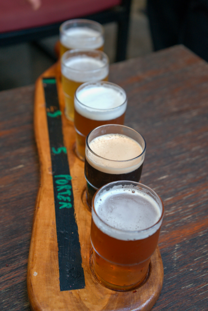 a sample flight of beer at pans taproom in Albania 