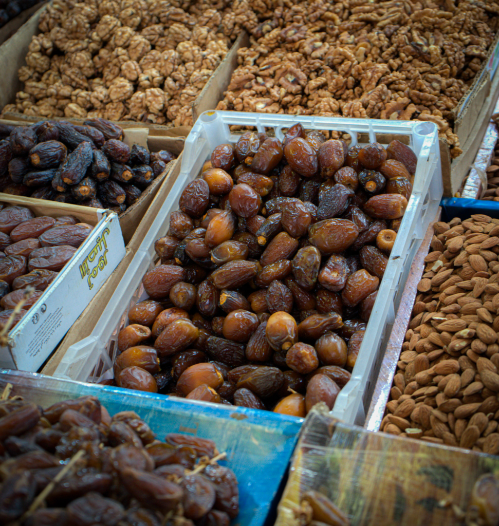 Colorful moroccan dates sitting in a pile at the market in Habous