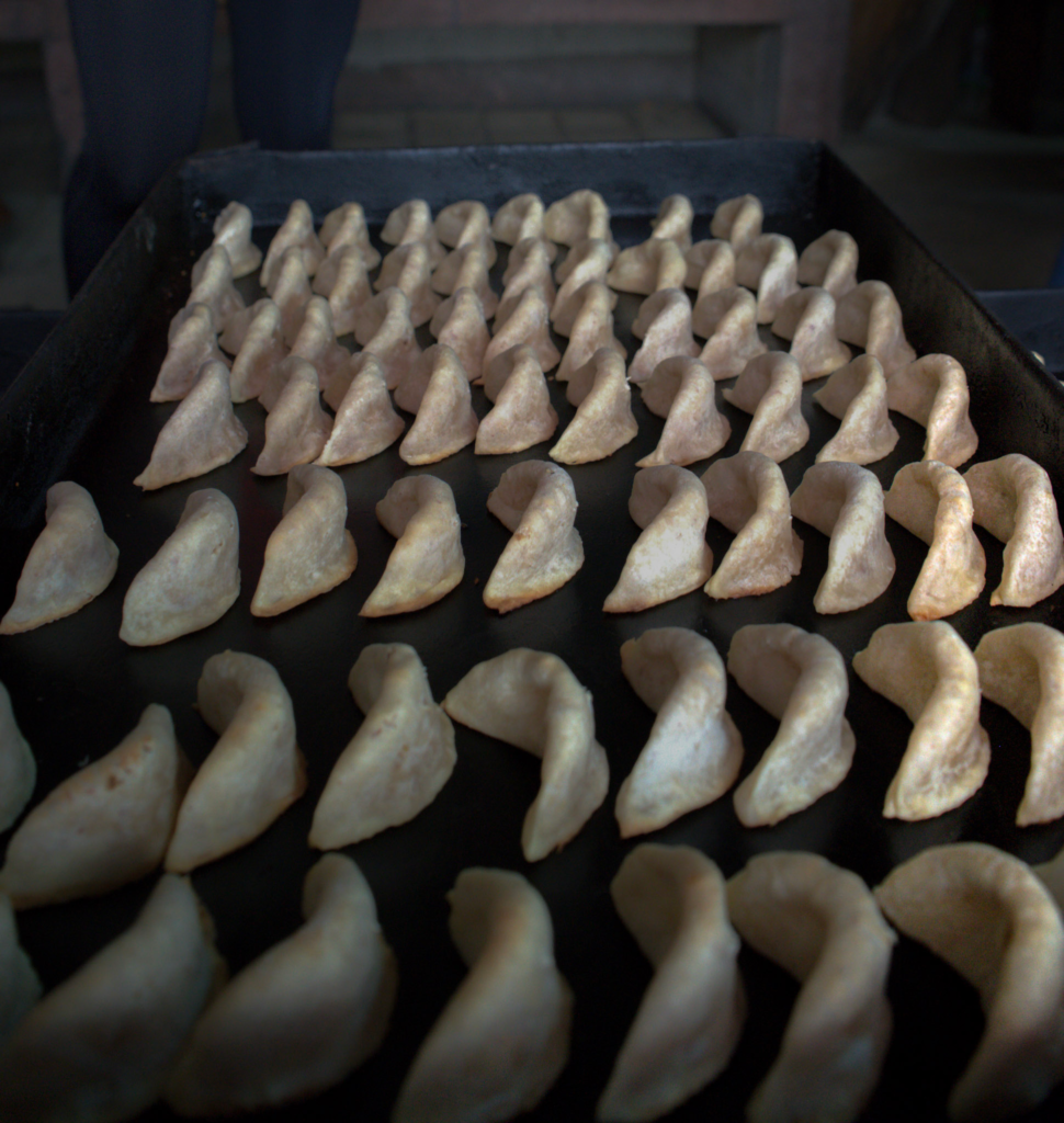 famous amande cookies just baked at Pâtisserie Bennis Habous sitting in rows on a table
