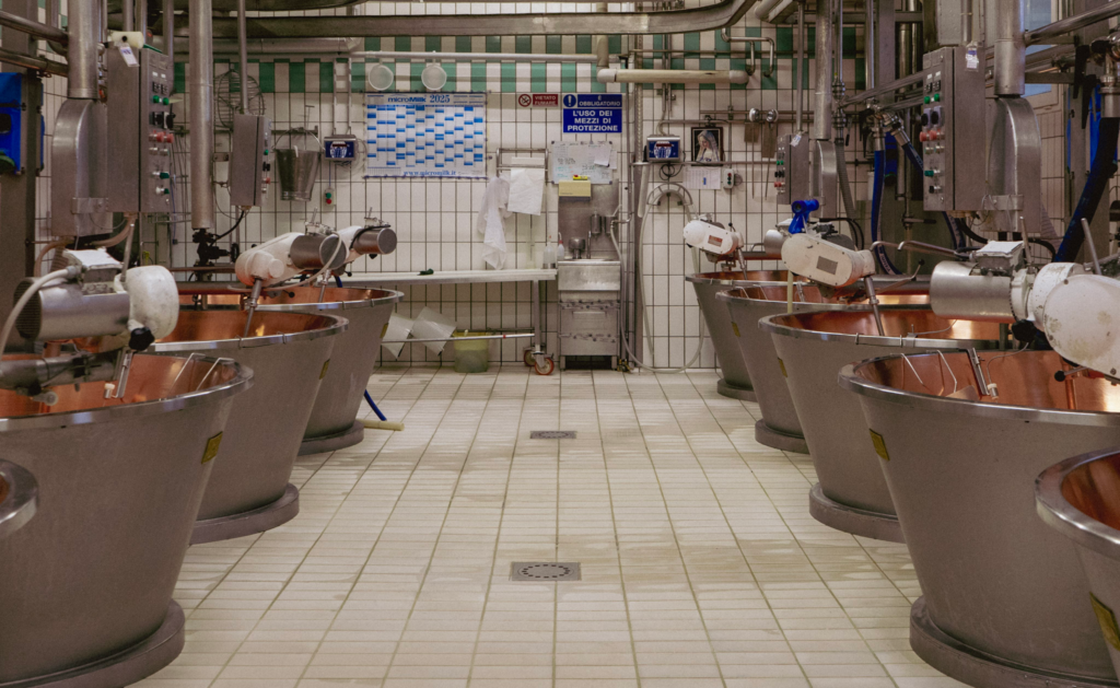 Copper Cheese Vats line the room at Caseficio Pennar