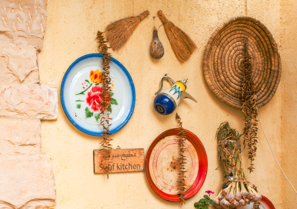Colorful plates hanging on a wall at Beit Khayrat Souf