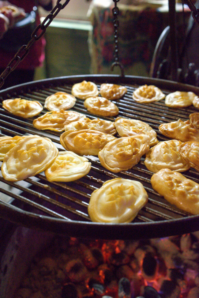 A grill with smoked polish cheese called Oscypek, which you can find at Christmas Markets in Poland