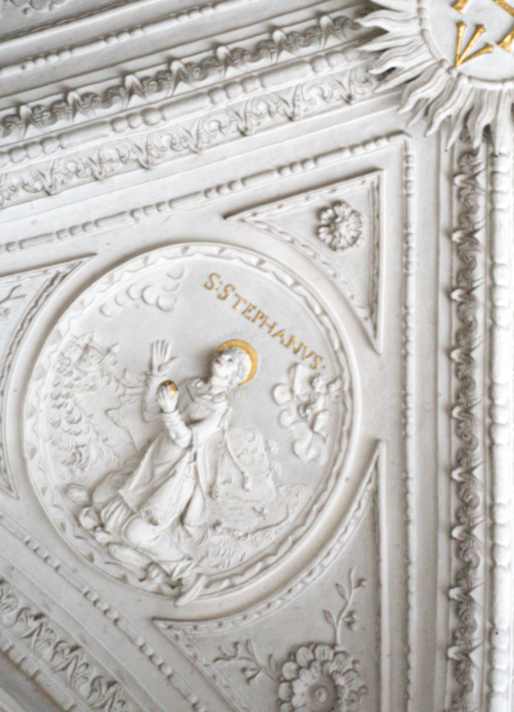 an image of a praying saint on the walls of st. andreas church