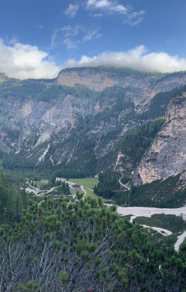 View of the Fanes Valley near Rifugio Pederu under a blue sky on the Alta Via 1