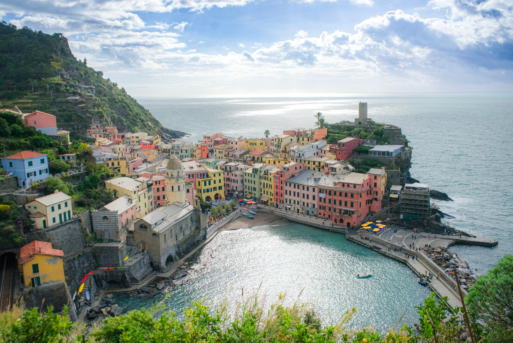 harbor view of vernazza, italy cinque terre with ocean view and bright vibrant buildings