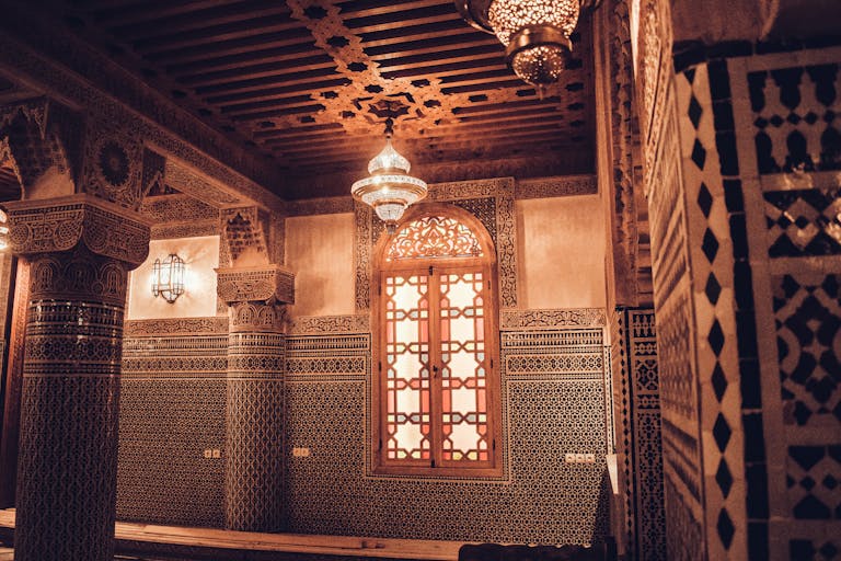 Stunning Moroccan interior showcasing intricate mosaics and Moorish craftsmanship in Fes.