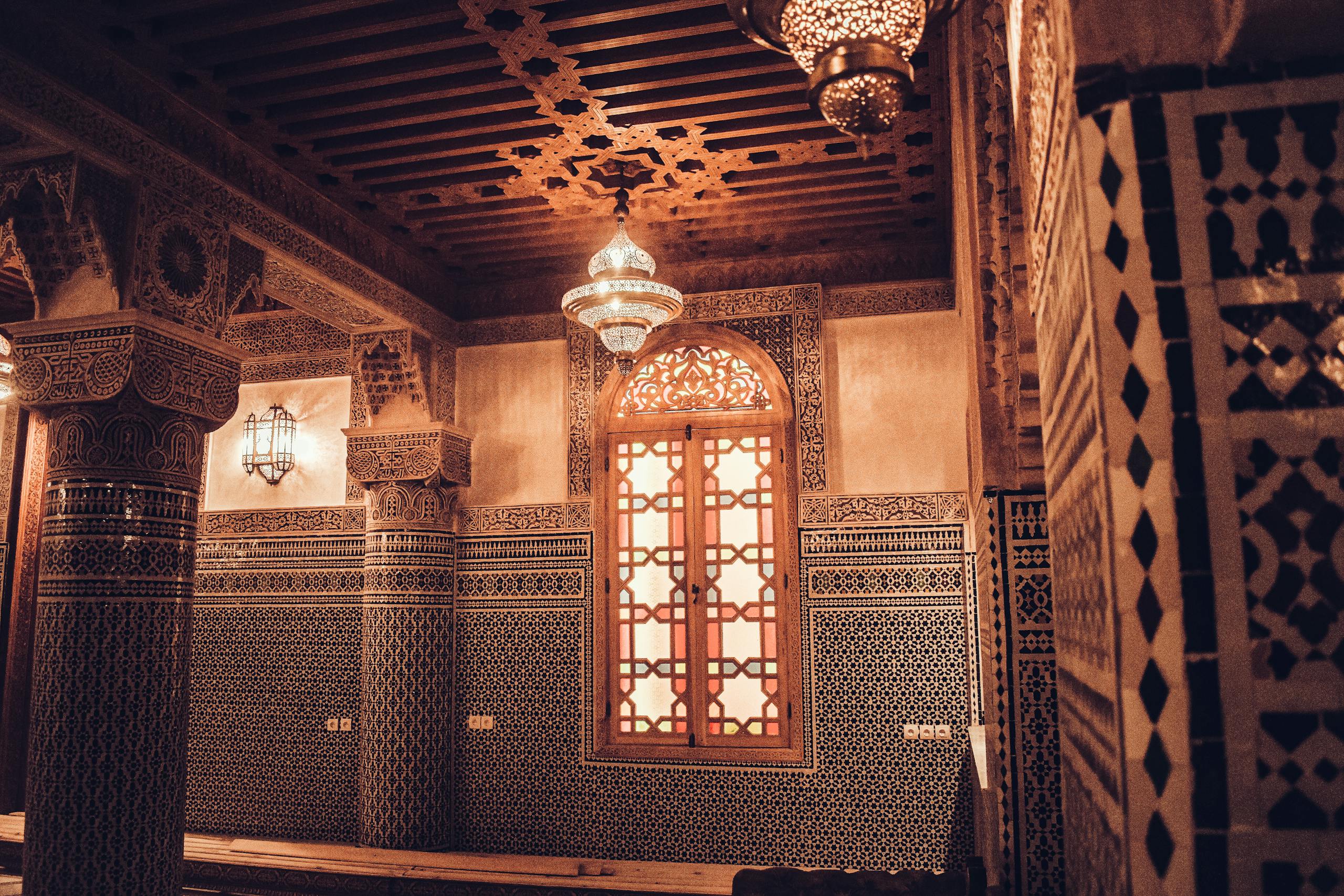 Stunning Moroccan interior showcasing intricate mosaics and Moorish craftsmanship in Fes.