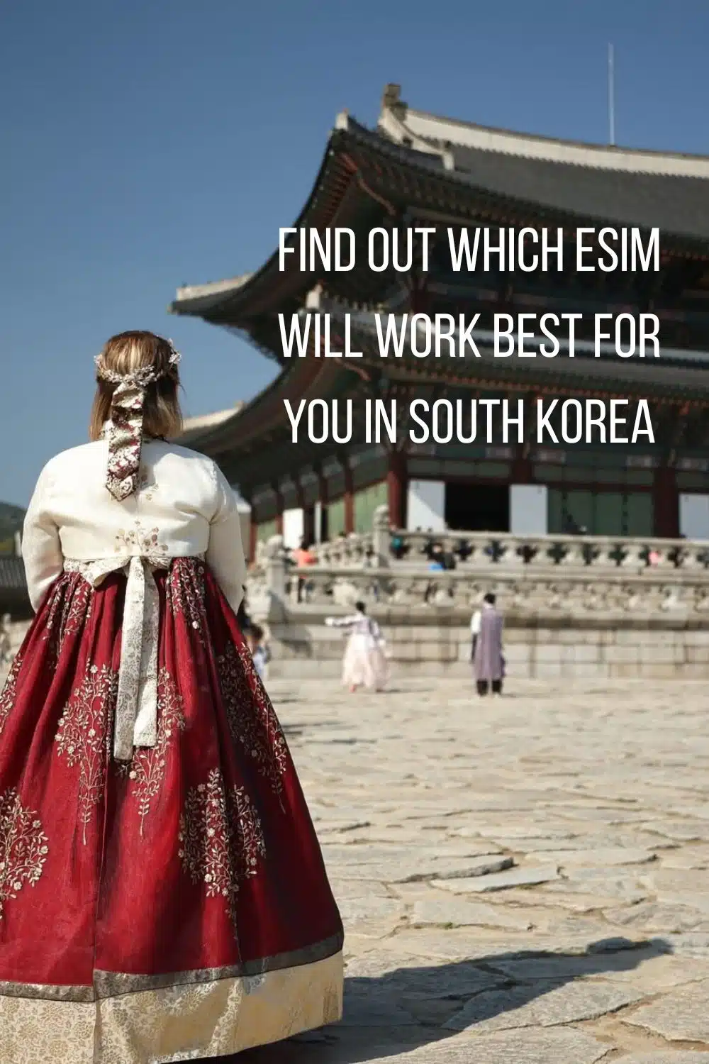Woman in a red and white hanbok facing Gyeongbokgung Palace in Seoul, with overlay text reading find out which eSIM will work best for you in South Korea.