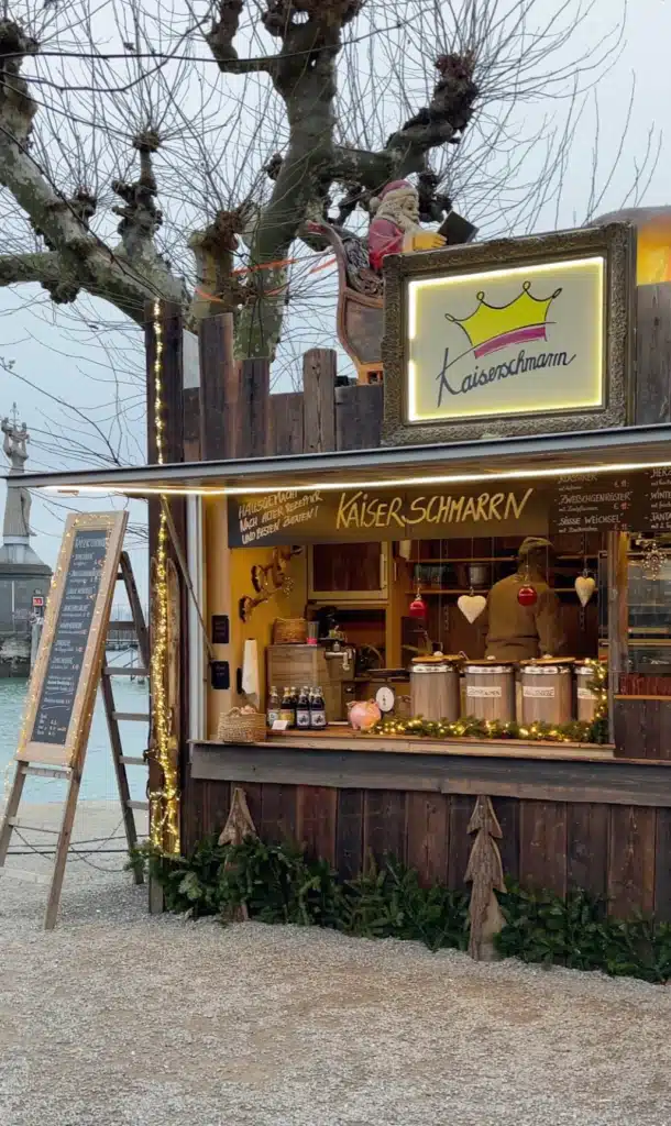 Kaiserschmarrn dessert stall with lakeside view at Konstanz Christmas Market