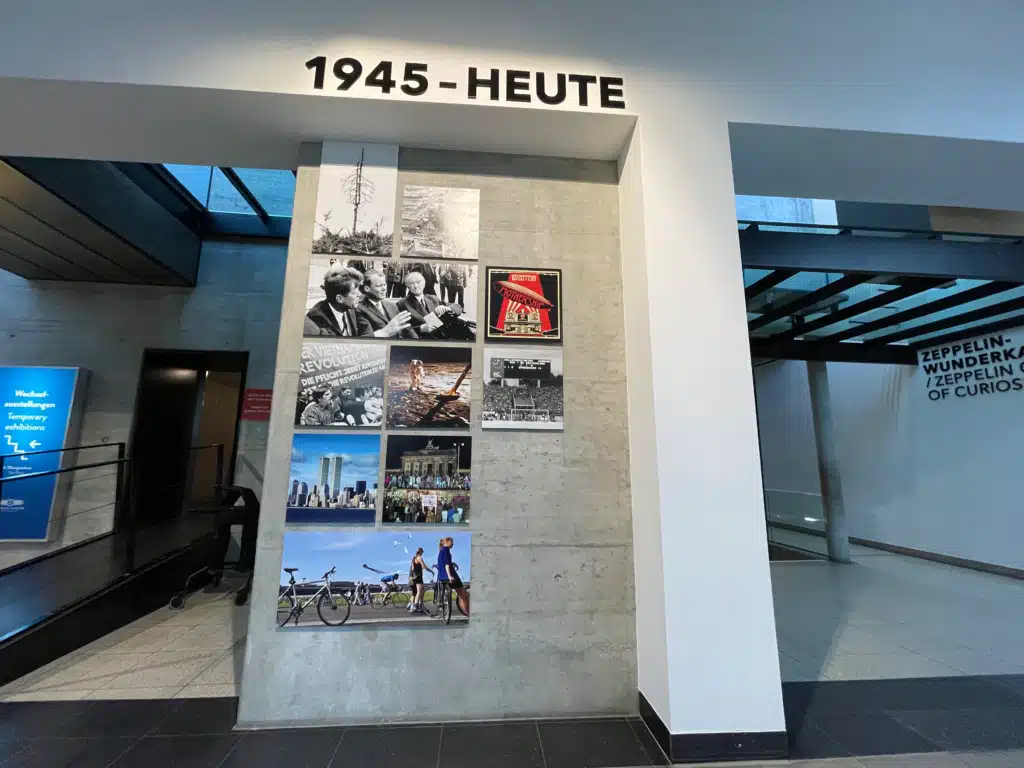 Photo collage exhibit wall marking 1945 to today at the Zeppelin Museum Friedrichshafen