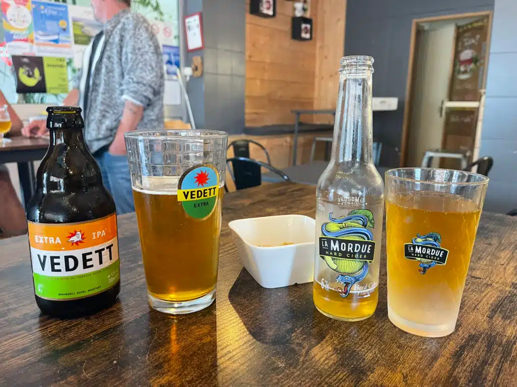 Beer and cider at the bar Vedett IPA and La Mordue cider at Le Caps Café, a casual bar in Wissant on the Côte d'Opale